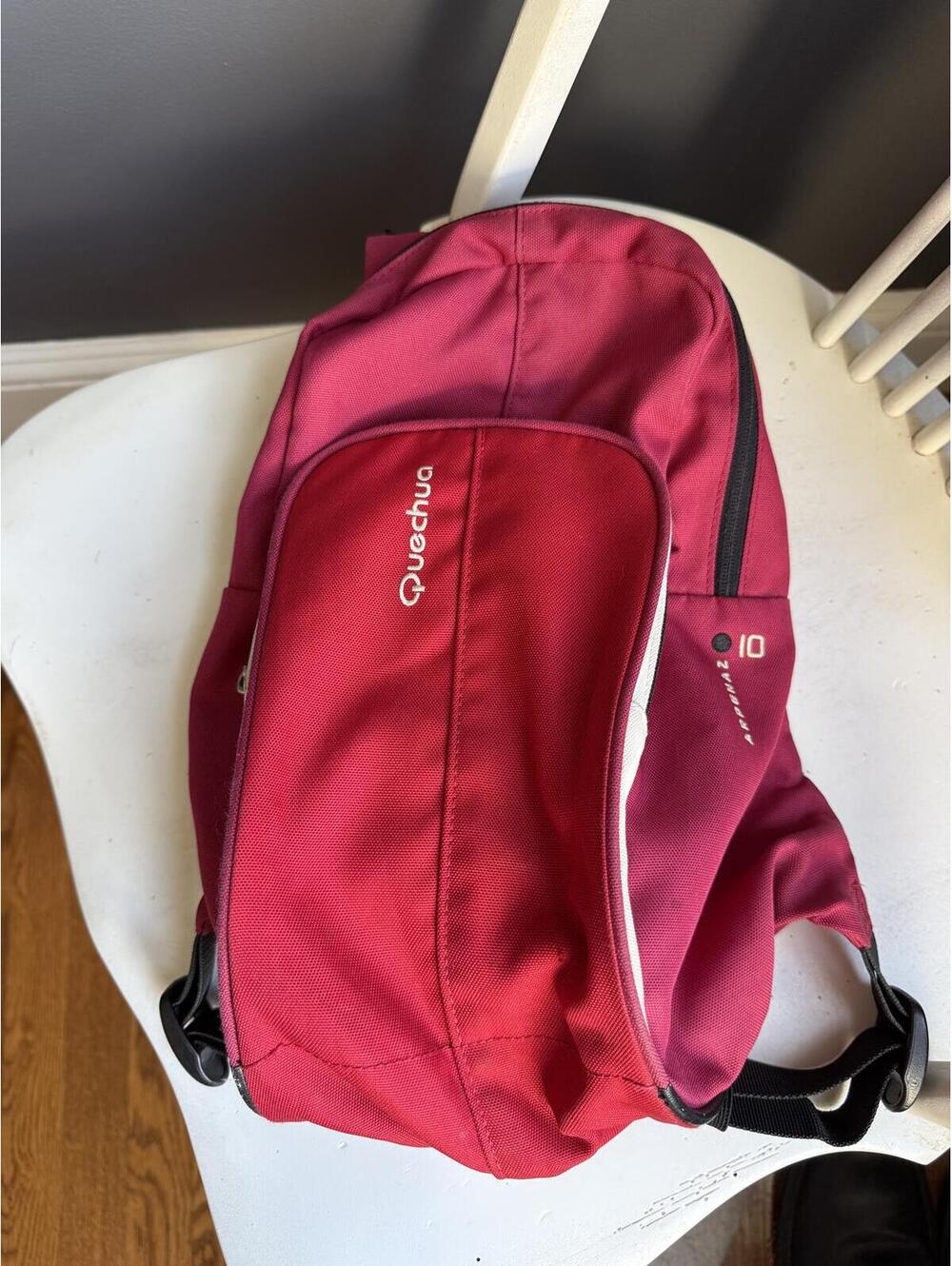 Quechua Arpenaz 10 Red Sling Backpack with Multiple Zippered Compartments